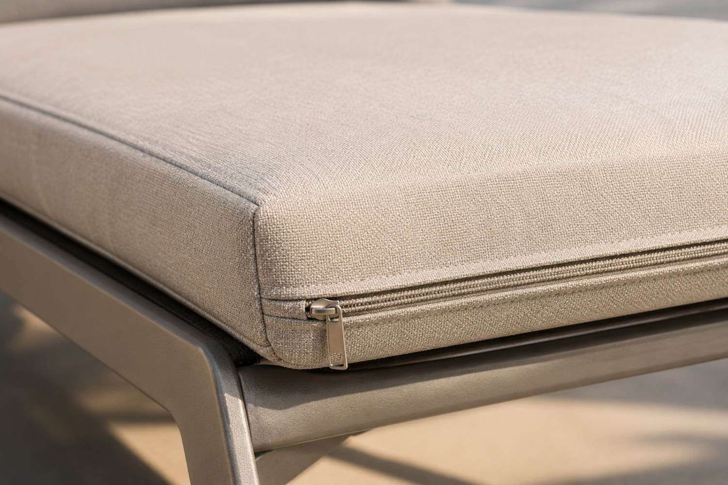 Plush cushioned chaise seat with a zippered, removable cover