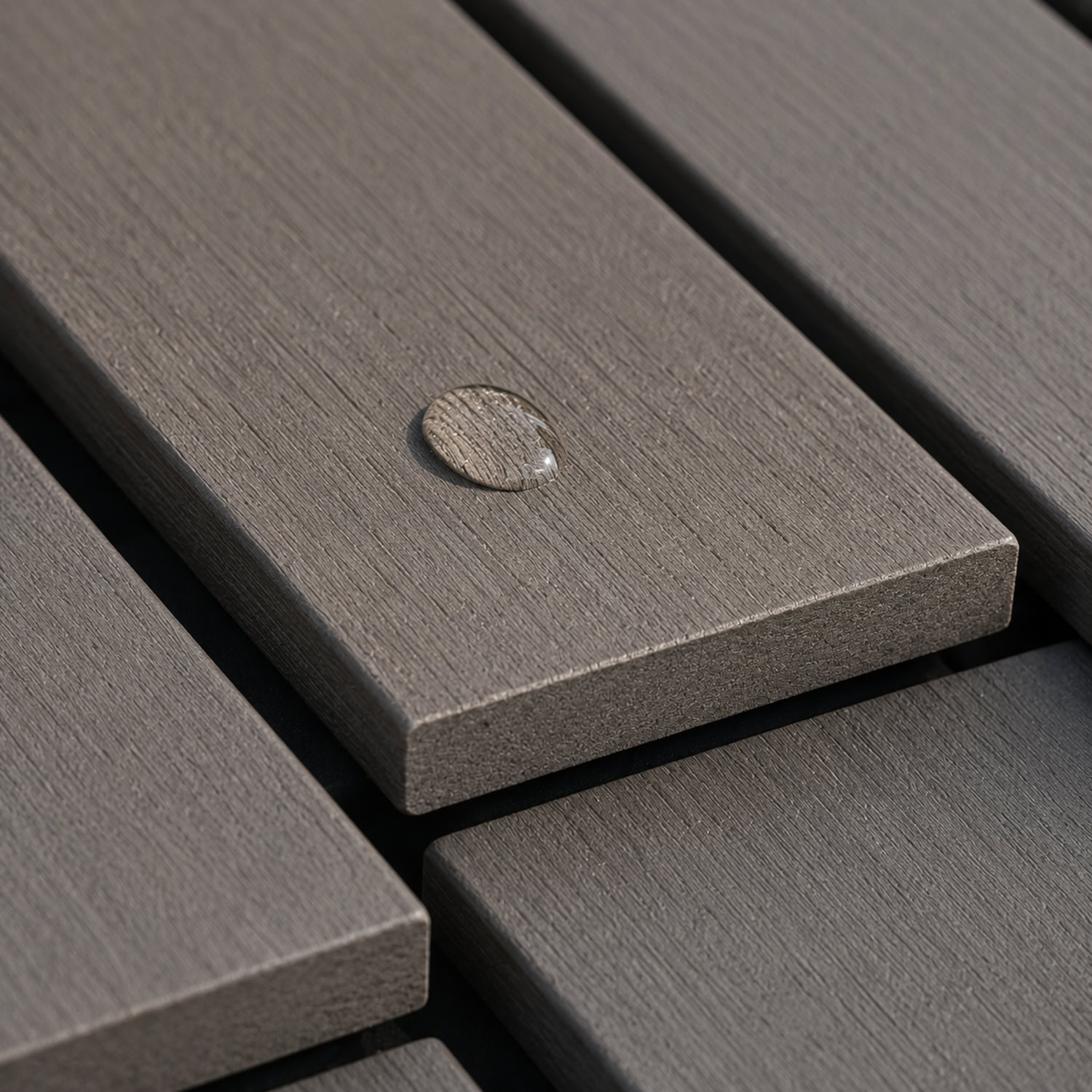 Close-up of matte HDPE poly lumber boards with a molded wood-look surface